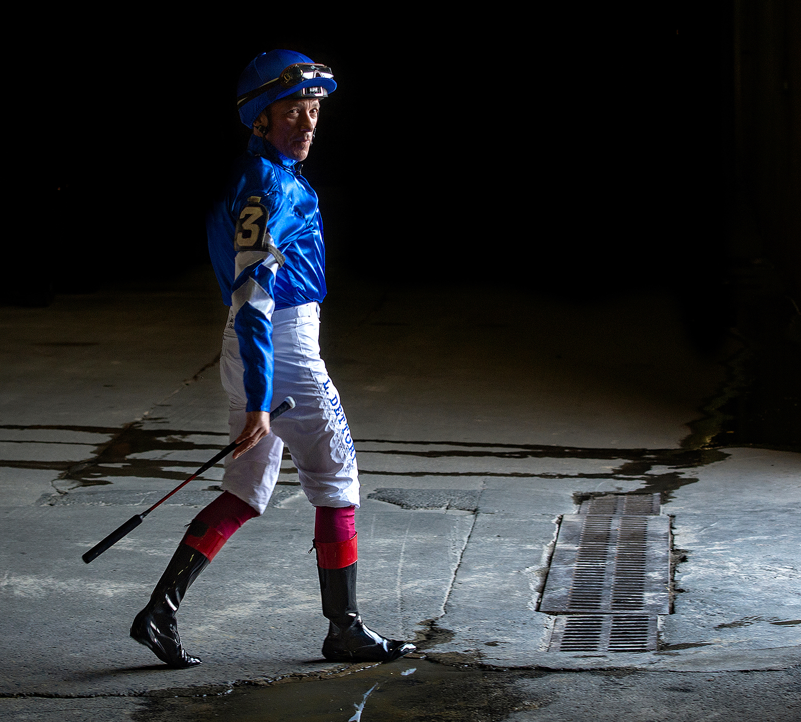 “Lanfranco Dettori heads out of the Big A tunnel” by Nancy Rokos