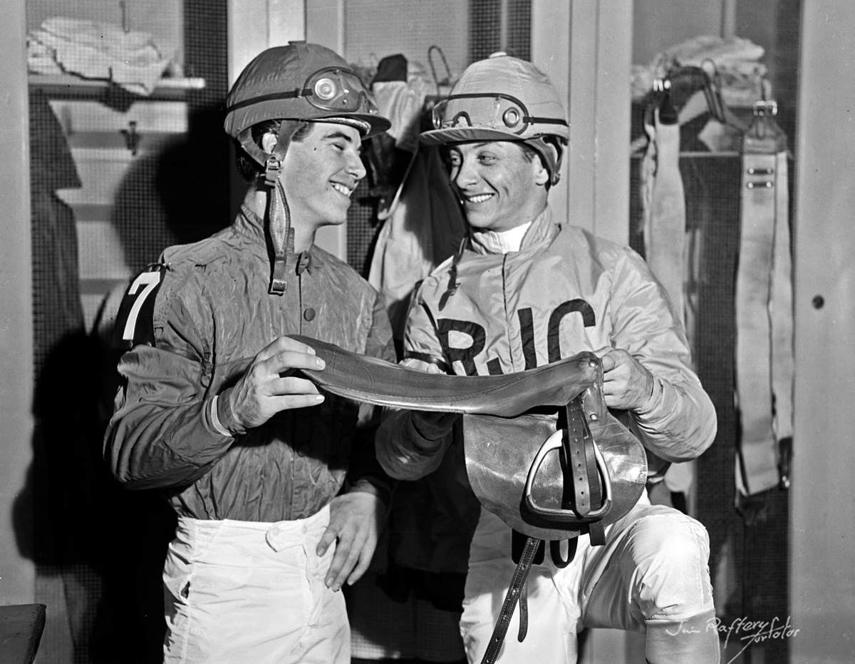 Bill Hartack, right, with Howard Grant, holding Hartack's Kentucky Derby saddle, May 10, 1960 (Jim Raftery Turfotos)