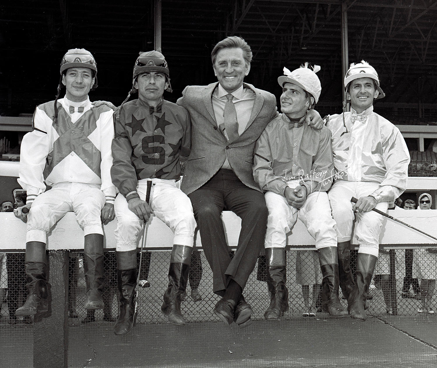 Kirk Douglas and jockeys, Monmouth Park, May 24, 1967 (Jim Raftery Turfotos)