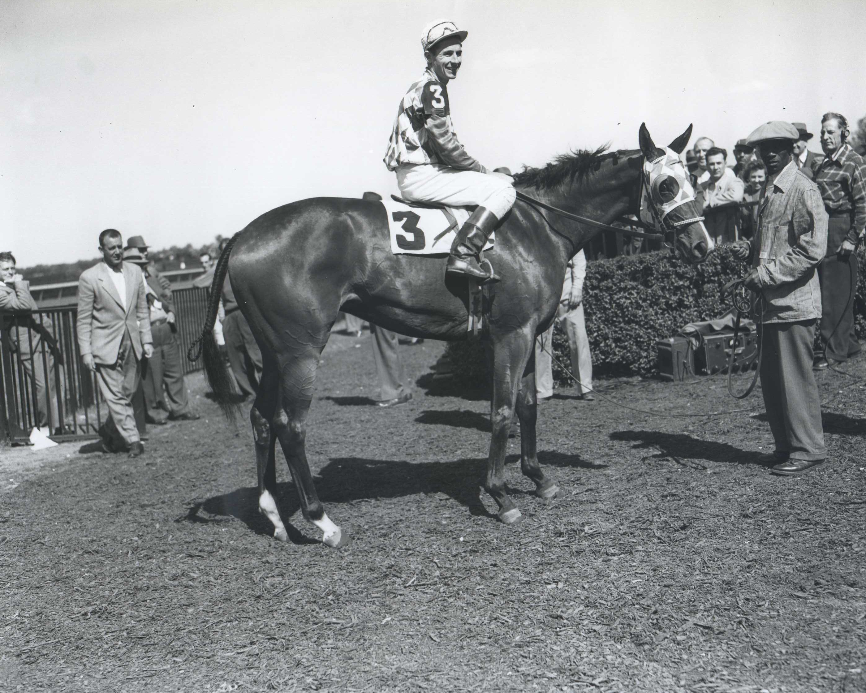 Bed o' Roses (Eric Guerin up) in the winner's circle for the 1949 National Stallion Stakes at Belmont Park (Keeneland Library Morgan Collection/Museum Collection)