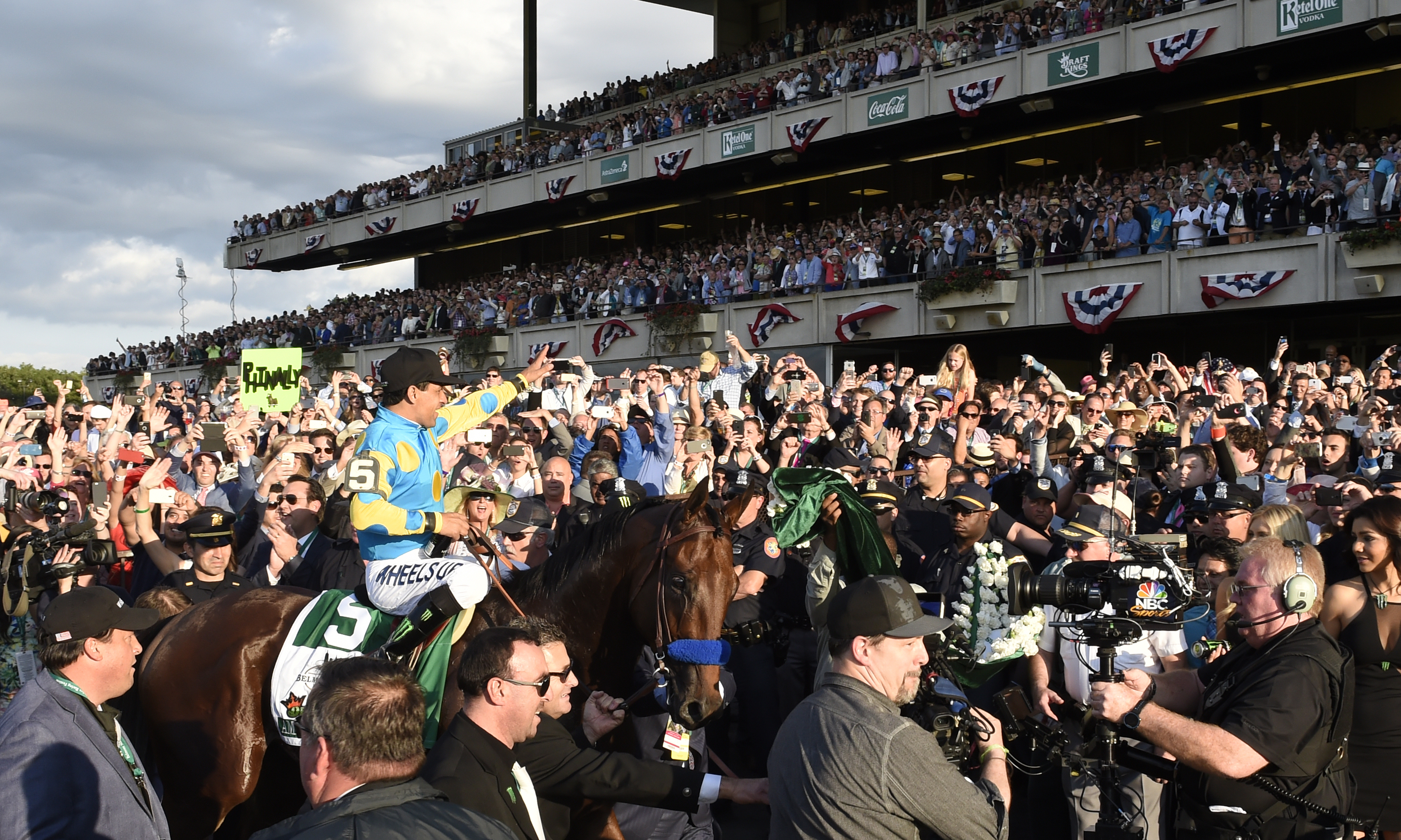 American Pharoah, Victor Espinoza up, after winning the 2015 Belmont Stakes to become America's 12th Triple Crown winner (Skip Dickstein)