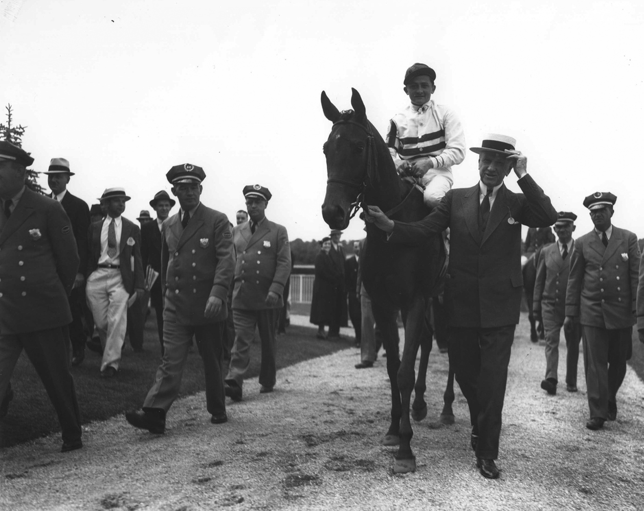 Black Helen entering the winner's circle after winning the 1935 Coaching Club American Oaks (Keeneland Library Morgan Collection/Museum Collection)