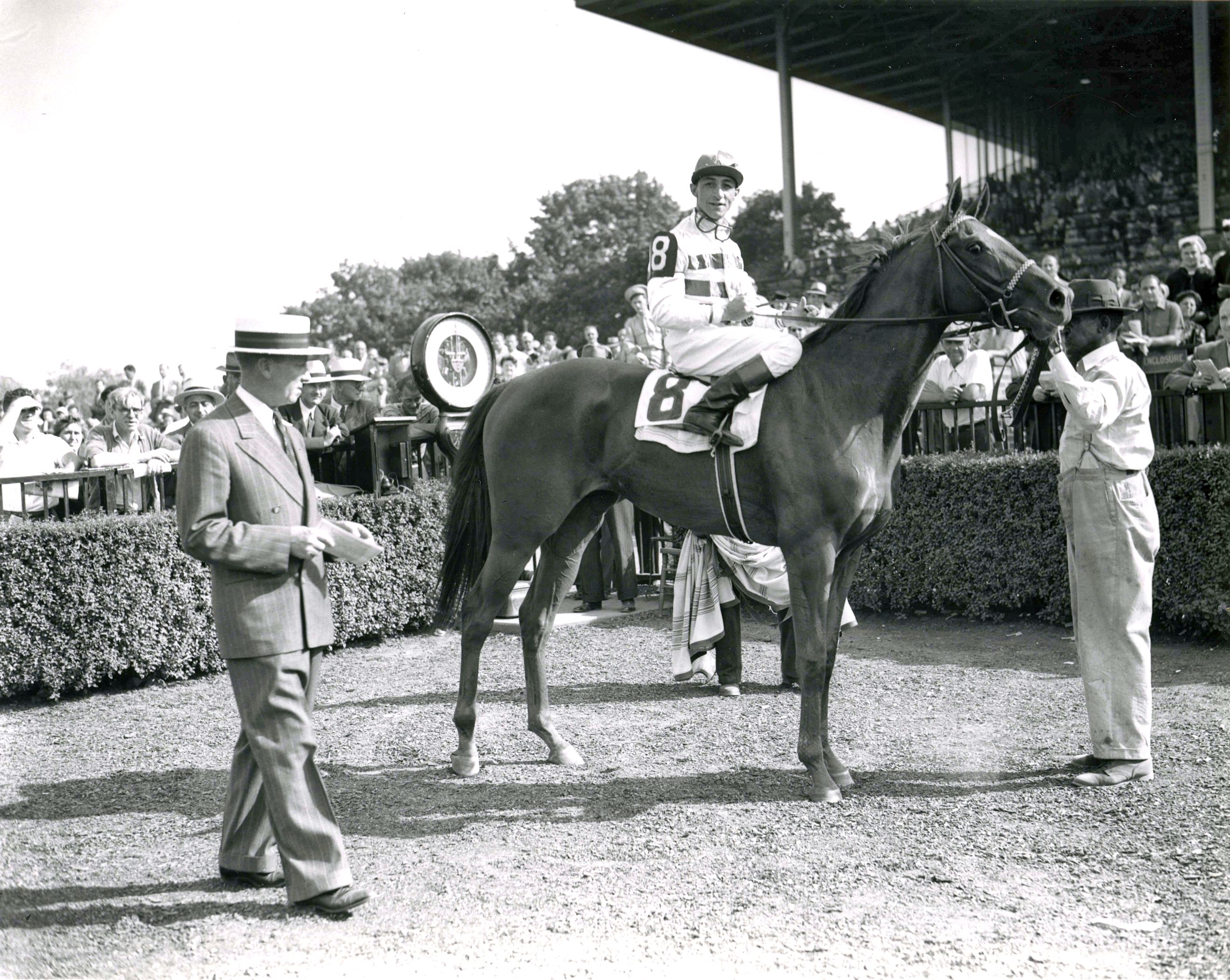 Busher (Eddie Arcaro up) in the winner's circle for 1944 Adirondack at Belmont Park (Keeneland Library Morgan Collection/Museum Collection)