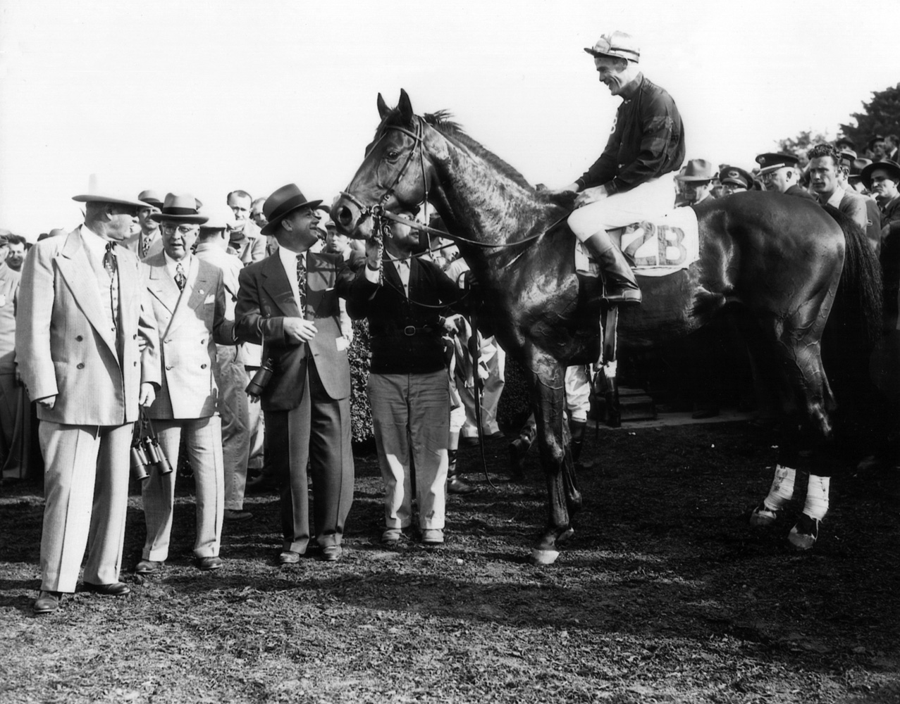 Citation (Al Snider up) in the winner's circle for the Belmont Futurity (Museum Collection)