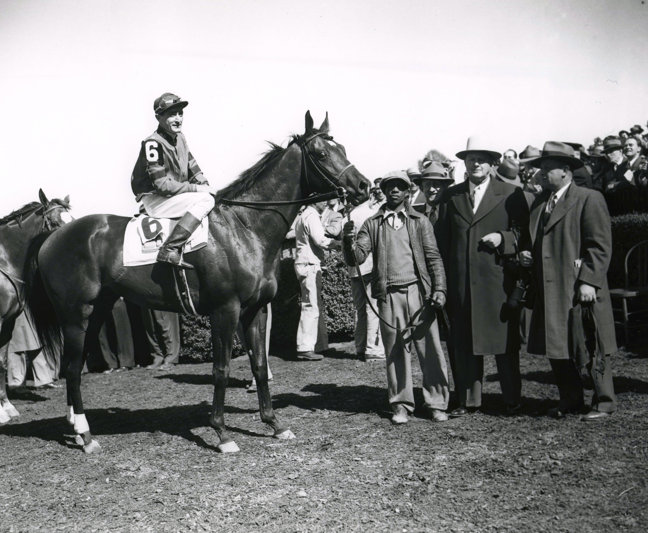 Coaltown in the winner's circle with Hall of Fame trainers Ben and Jimmy Jones for the 1948 Swift Stakes at Belmont Park (Keeneland Library Morgan Collection/Museum Collection)