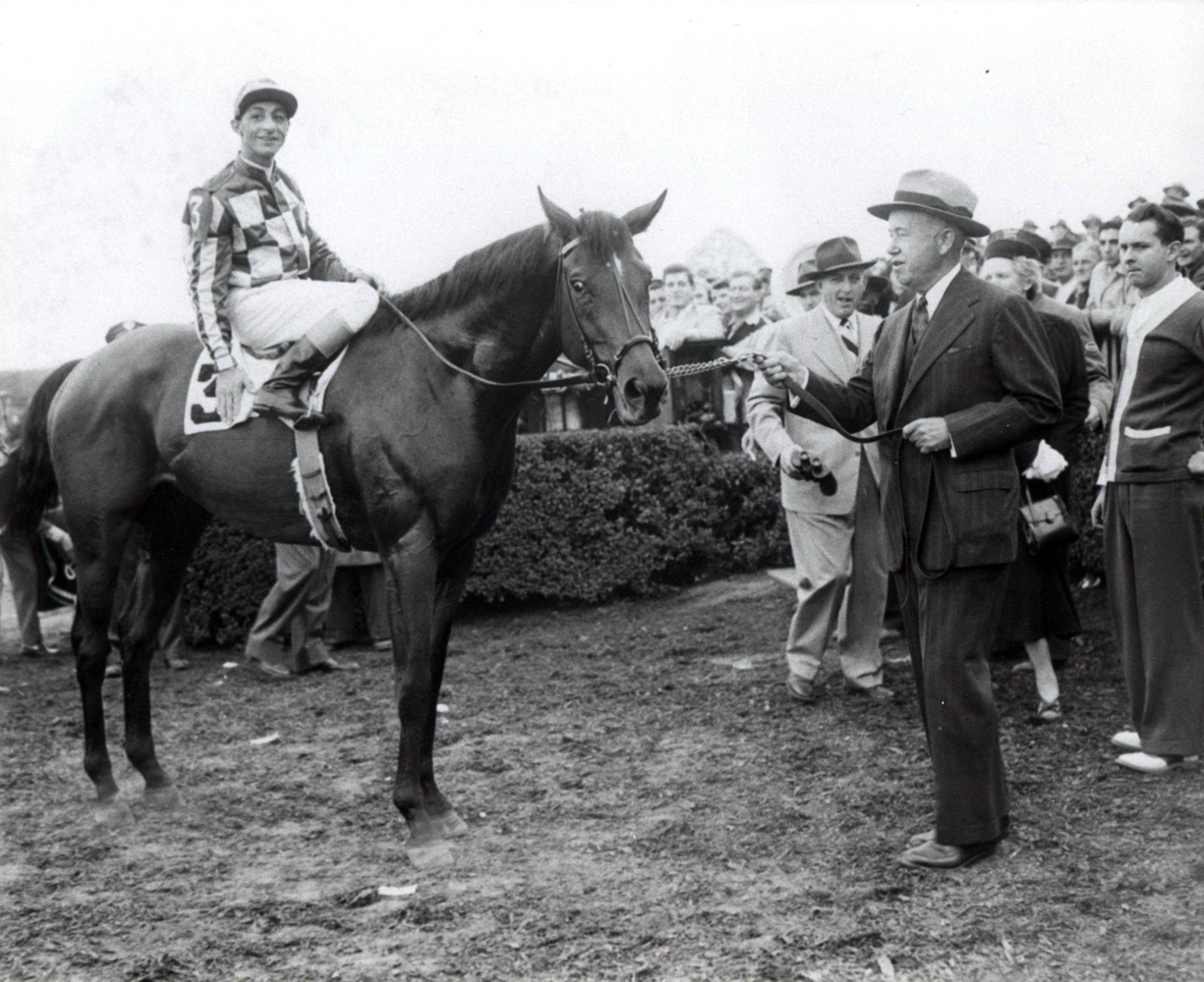 Hill Prince (Eddie Arcaro up) and owner Christopher Chenery in the winner's circle for the 1950 Jockey Club Gold Cup (The BloodHorse/Museum Collection)