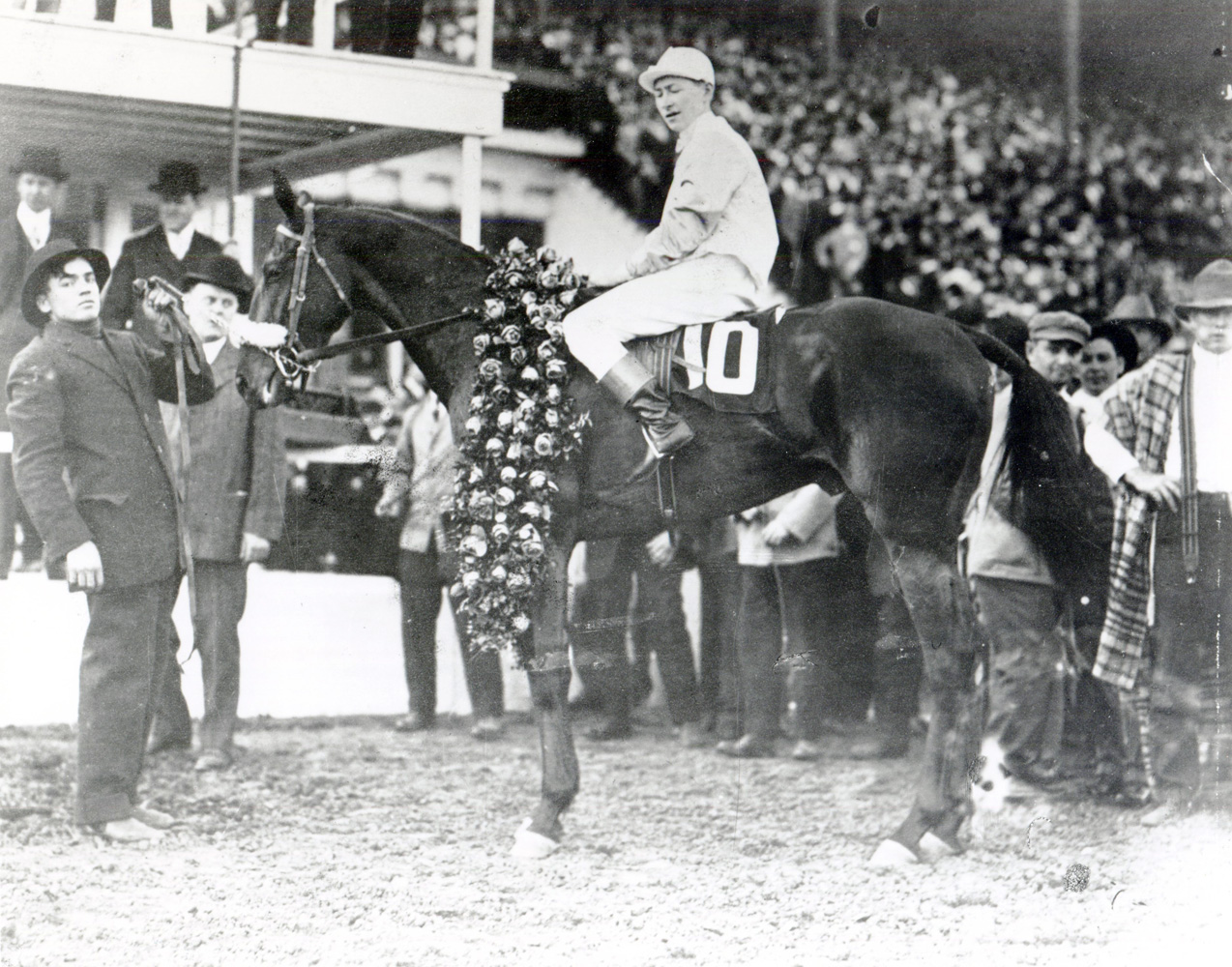 Old Rosebud (John McCabe up) in the winner's circle for the 1914 Kentucky Derby (Churchill Downs Inc./Kinetic Corp. /Museum Collection)