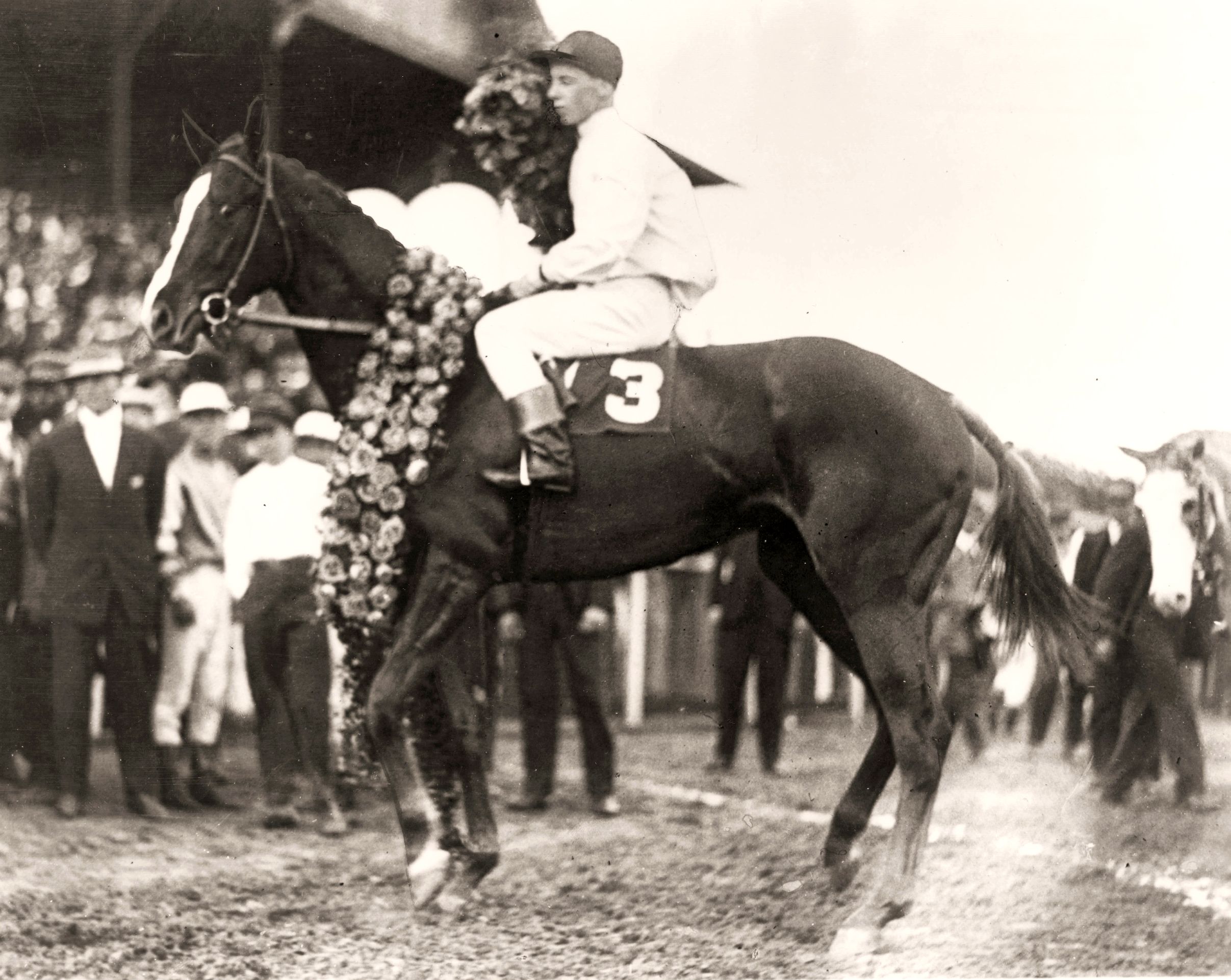 Regret (Joe Notter up) in the winner's circle after the 1915 Kentucky Derby (Churchill Downs Inc./Museum Collection)