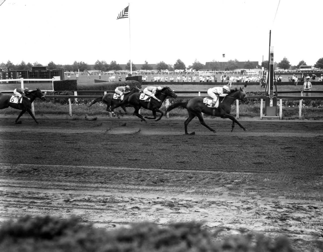 Searching (Conn McCreary up) winning the 1955 Vagrancy Handicap at Aqueduct (Keeneland Library Morgan Collection/Museum Collection)