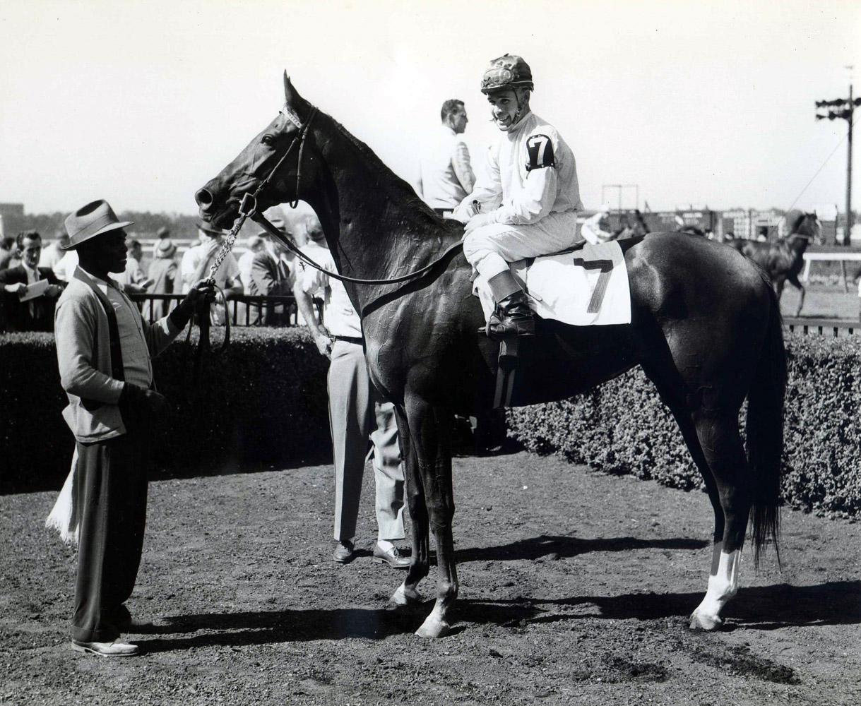 Silver Spoon (Eldon Nelson up) in the winner's circle at Belmont Park for her very first career start, September 1958 (Mike Sirico/Museum Collection)