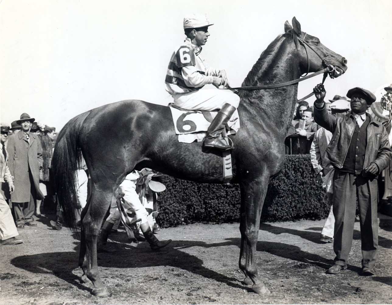 Stymie in the winner's circle with Basil James up (Museum Collection)