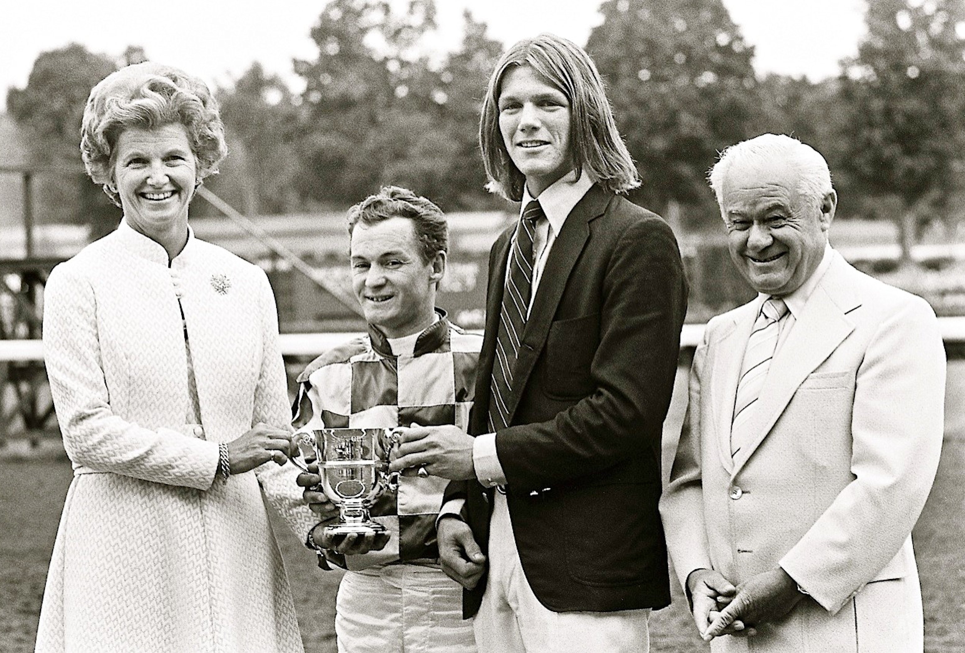 Penny Chenery, left, celebrates with Ron Turcotte, Peter Sanford Wood, and Lucien Laurin, after Secretariat's victory in the 1972 Sanford Stakes at Saratoga (Douglas Lees)