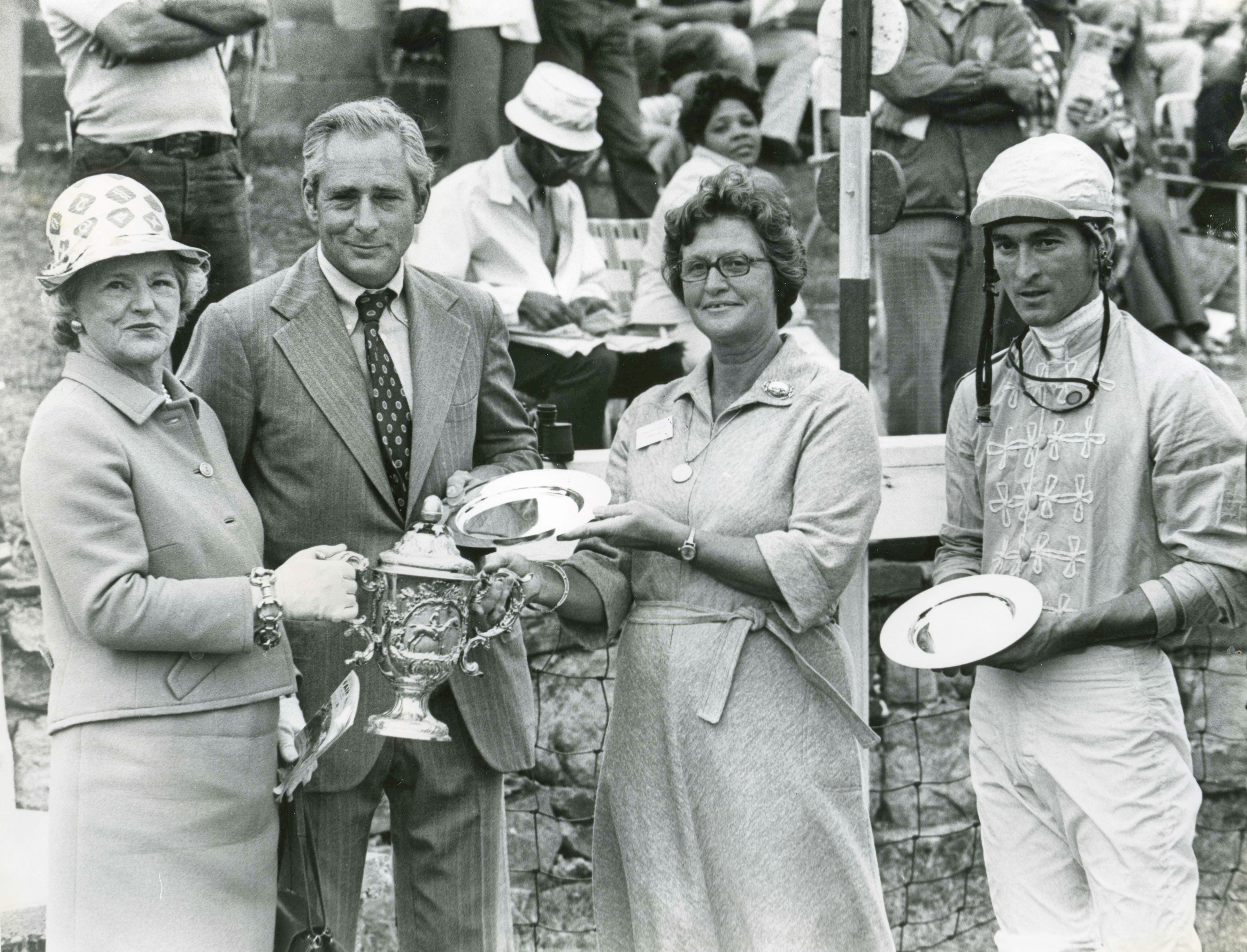 Jerry Fishback (on right) in winners circle with owner Mrs. Ogden Phipps and trainer D. M. Smithwick after the 1976 Grand National Steeplechase Handicap (Douglas Lees/Museum Collection)