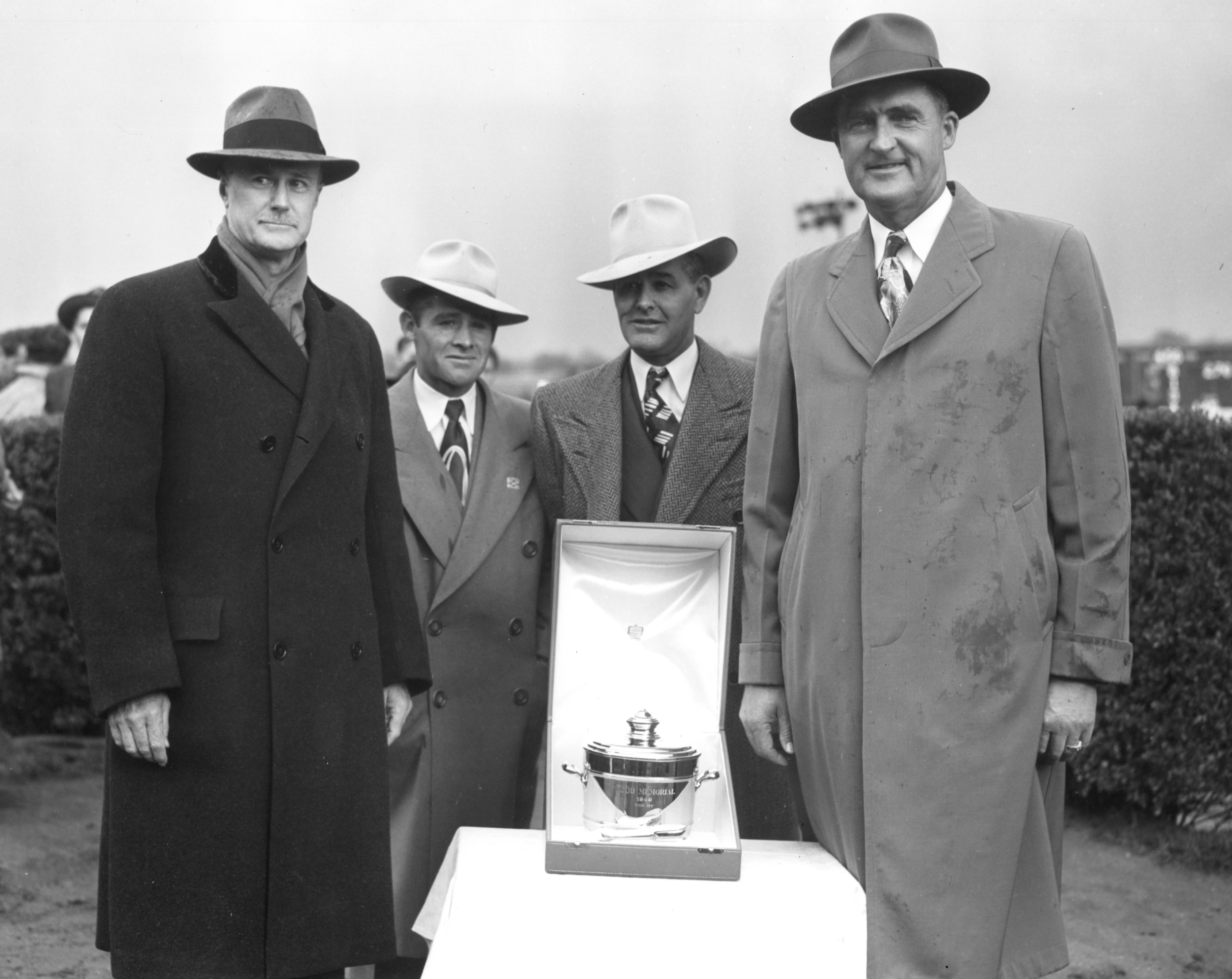 John Morris, Charles Parke, Ivan Parke, and Fred Hooper at the trophy presentation for the 1949 Wood Memorial at Jamaica (won by Olympia) (Keeneland Library Morgan Collection/Museum Collection)
