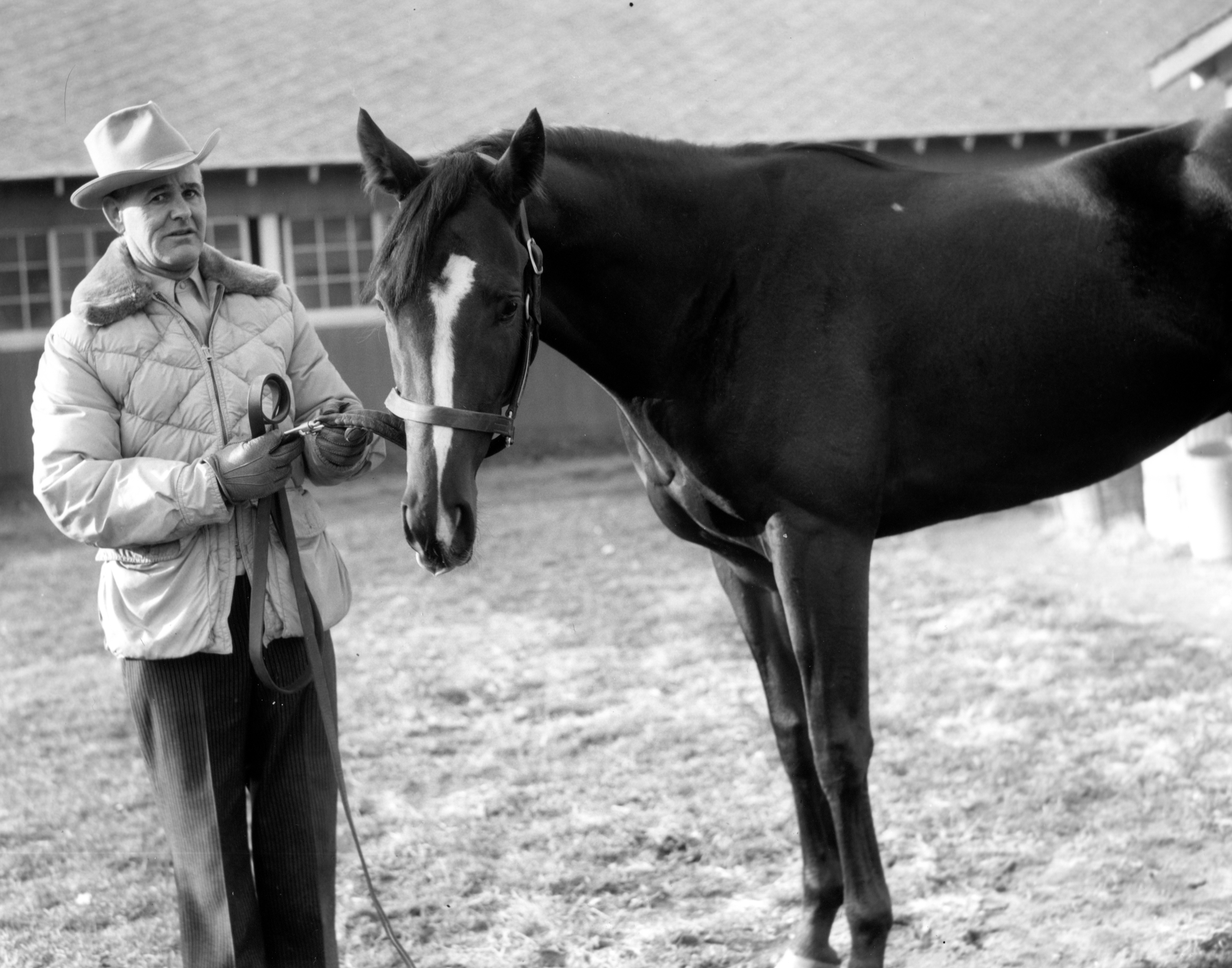 Ivan Parke, in his new role as trainer, with Jewel's Reward at Belmont Park, November 1957 (Keeneland Library Morgan Collection/Museum Collection)