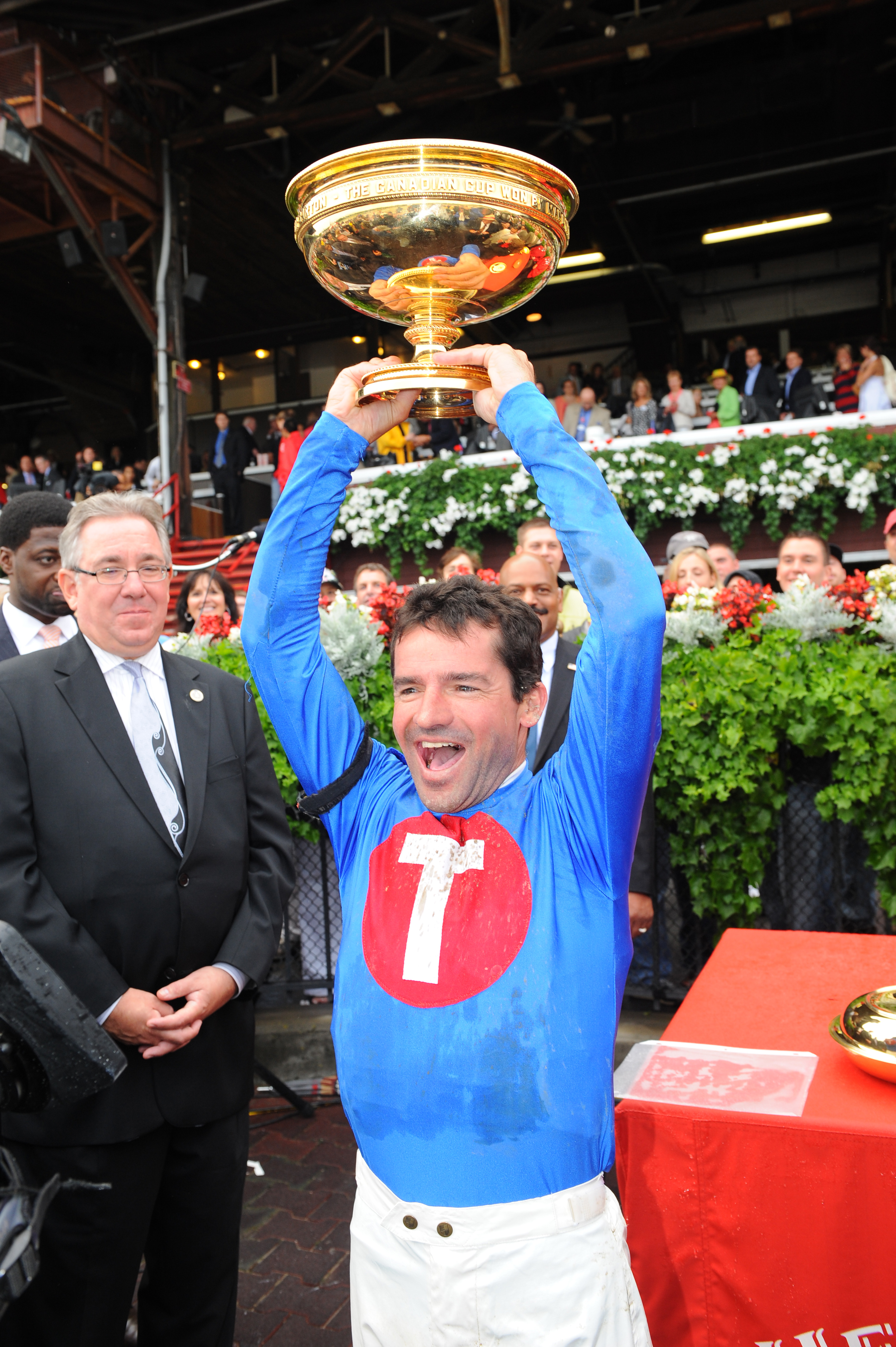 Kent Desormeaux celebrates winning the 2009 Travers Stakes with Summer Bird (NYRA)