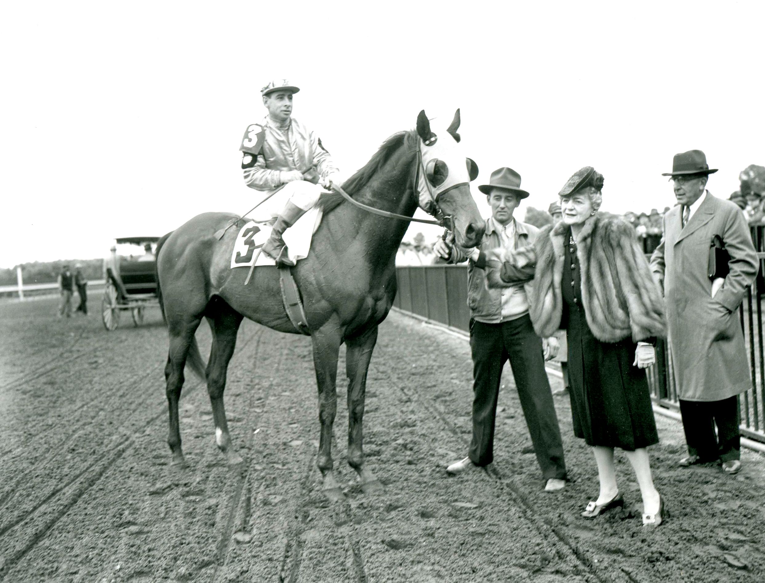 Count Fleet (Johnny Longden up) with owner Fannie Hertz in the winner's circle for the 1943 Withers at Belmont Park (Keeneland Library Morgan Collection/Museum Collection)
