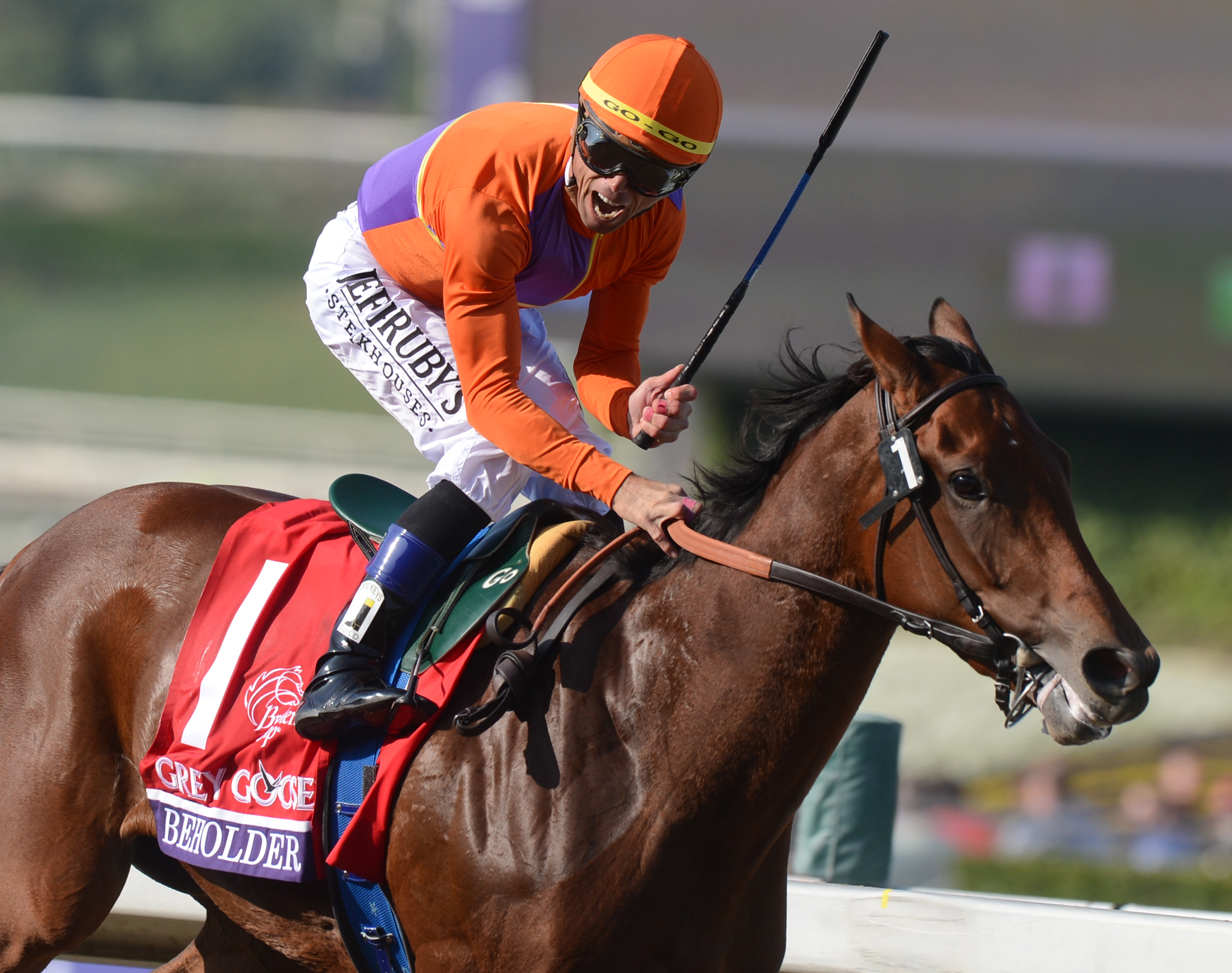 Garrett Gomez winning the 2012 Breeders' Cup Juvenile Fillies with Beholder (Breeders' Cup Photo)