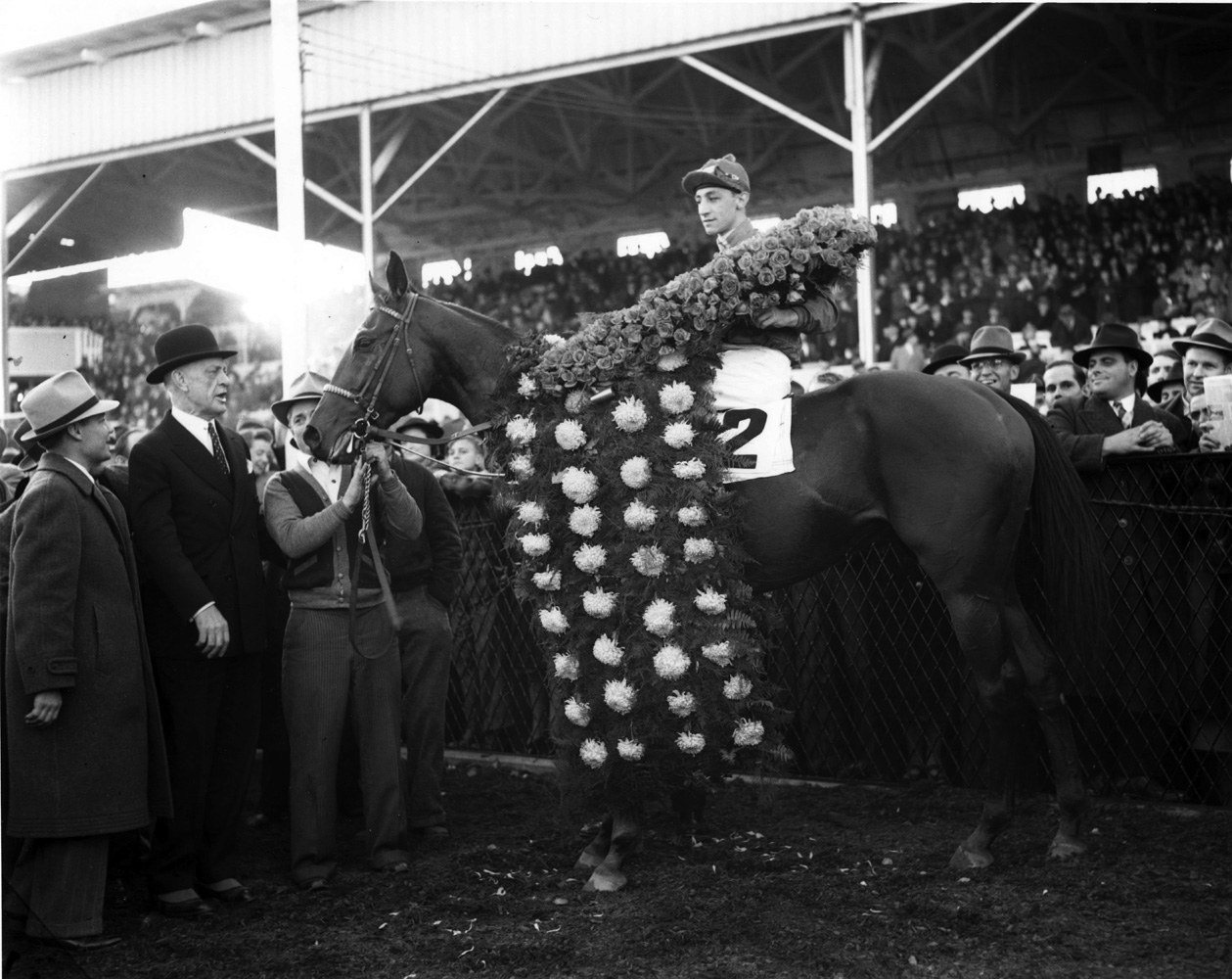 Eddie Arcaro and Challedon in the winner's circle for the 1939 Pimlico Special (Keeneland Library Morgan Collection/Museum Collection)