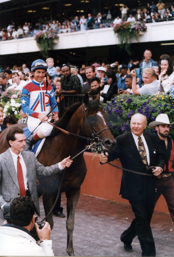 Jerry Bailey and Cigar entering the winner's circle after winning the 1995 Woodward at Belmont Park (Barbara Ann Giove Coletta/Museum Collection)