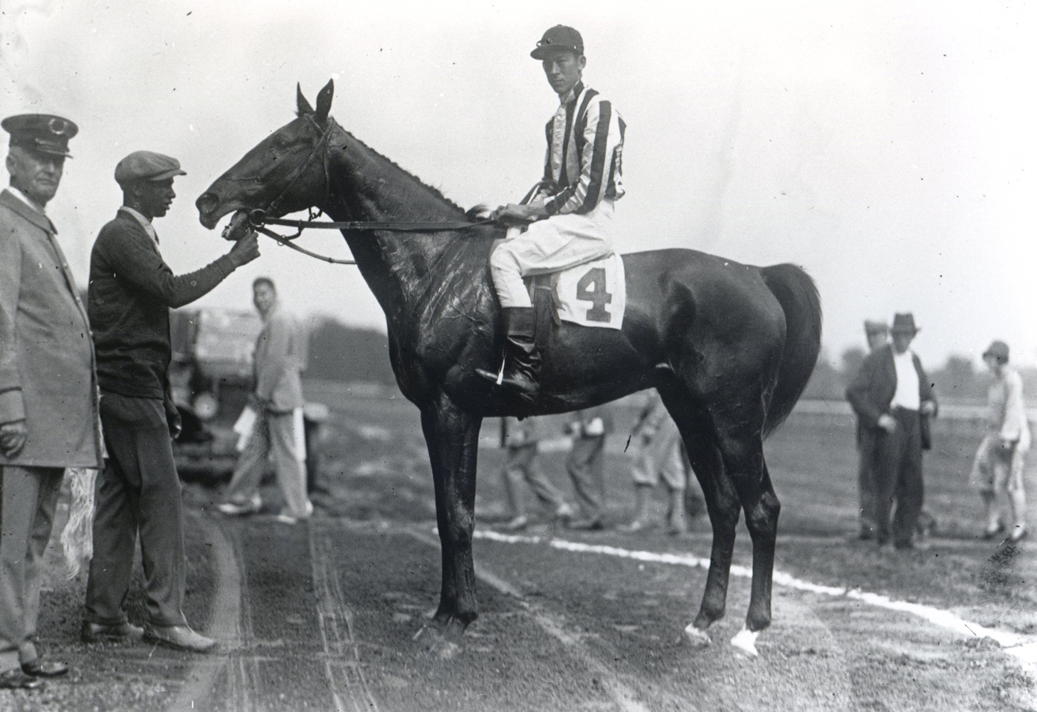 J. Dallett Byers and Lorenzo in the winner's circle at Saratoga (Keeneland Library Cook Collection/Museum Collection)