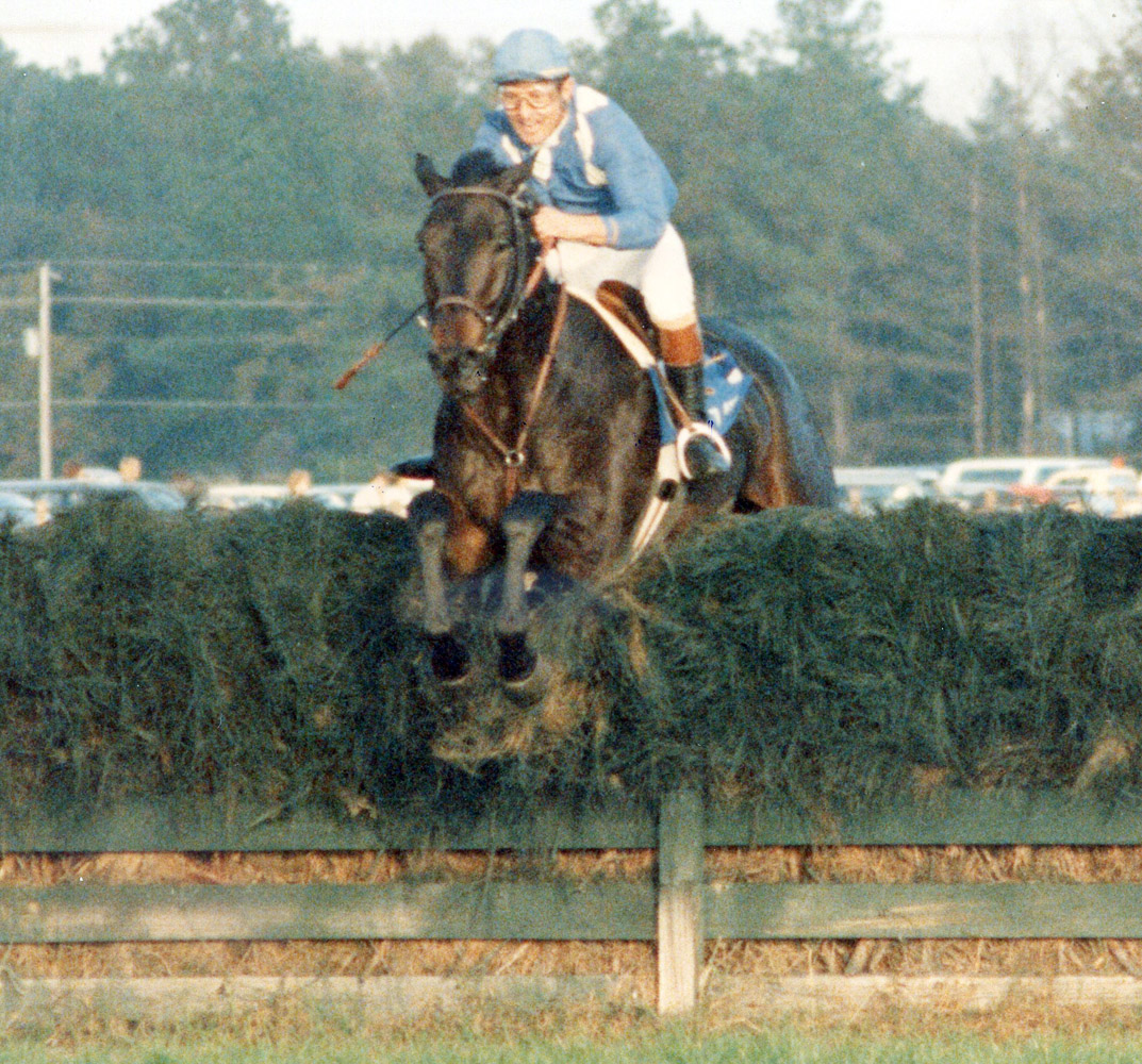 Jerry Fishback and Flatterer clearing a jump in the Colonial Cup (Catherine French/Museum Collection)