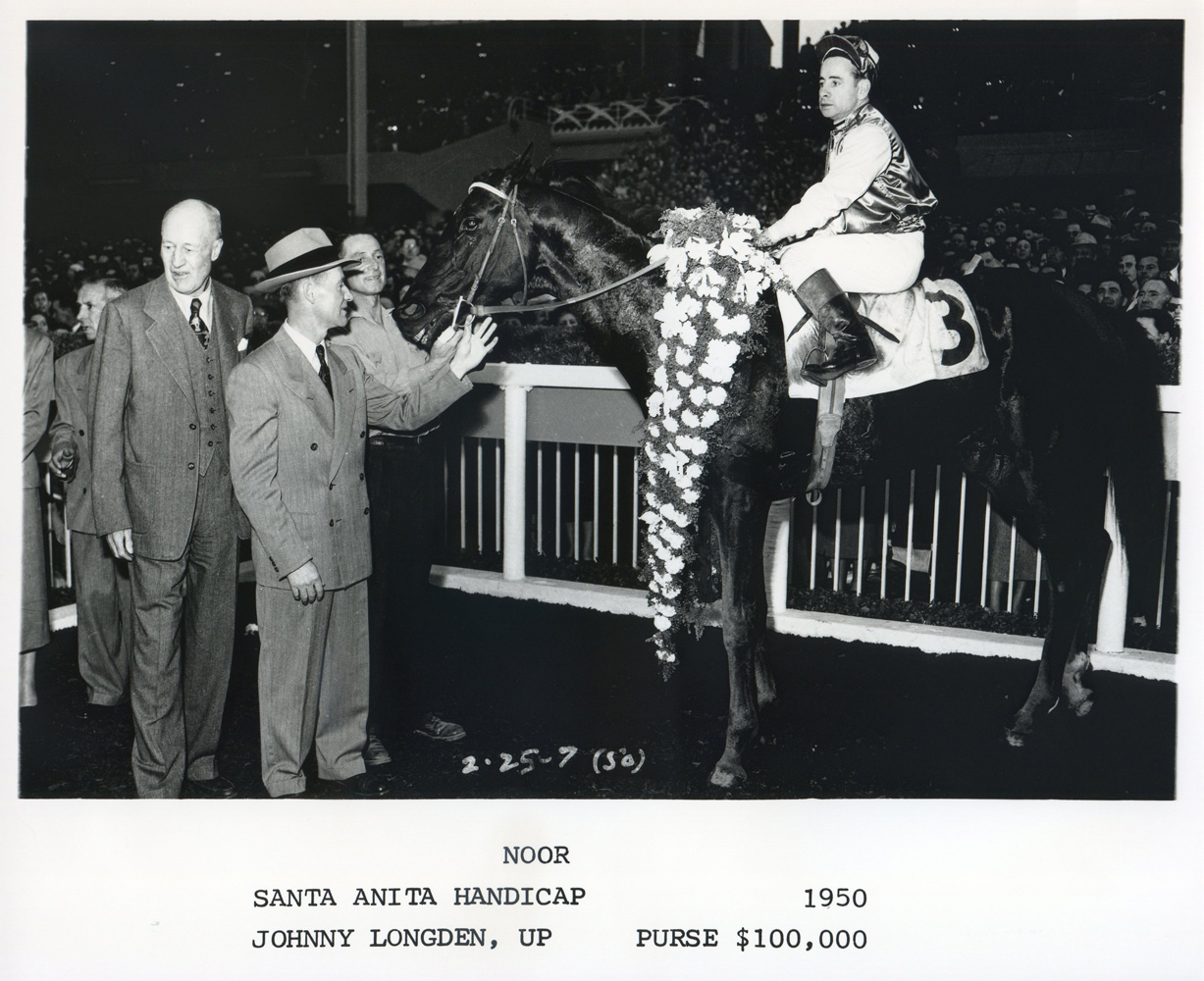 Johnny Longden and Noor in the winner's circle after winning the 1950 Santa Anita Handicap (Bill Mochon/Museum Collection)