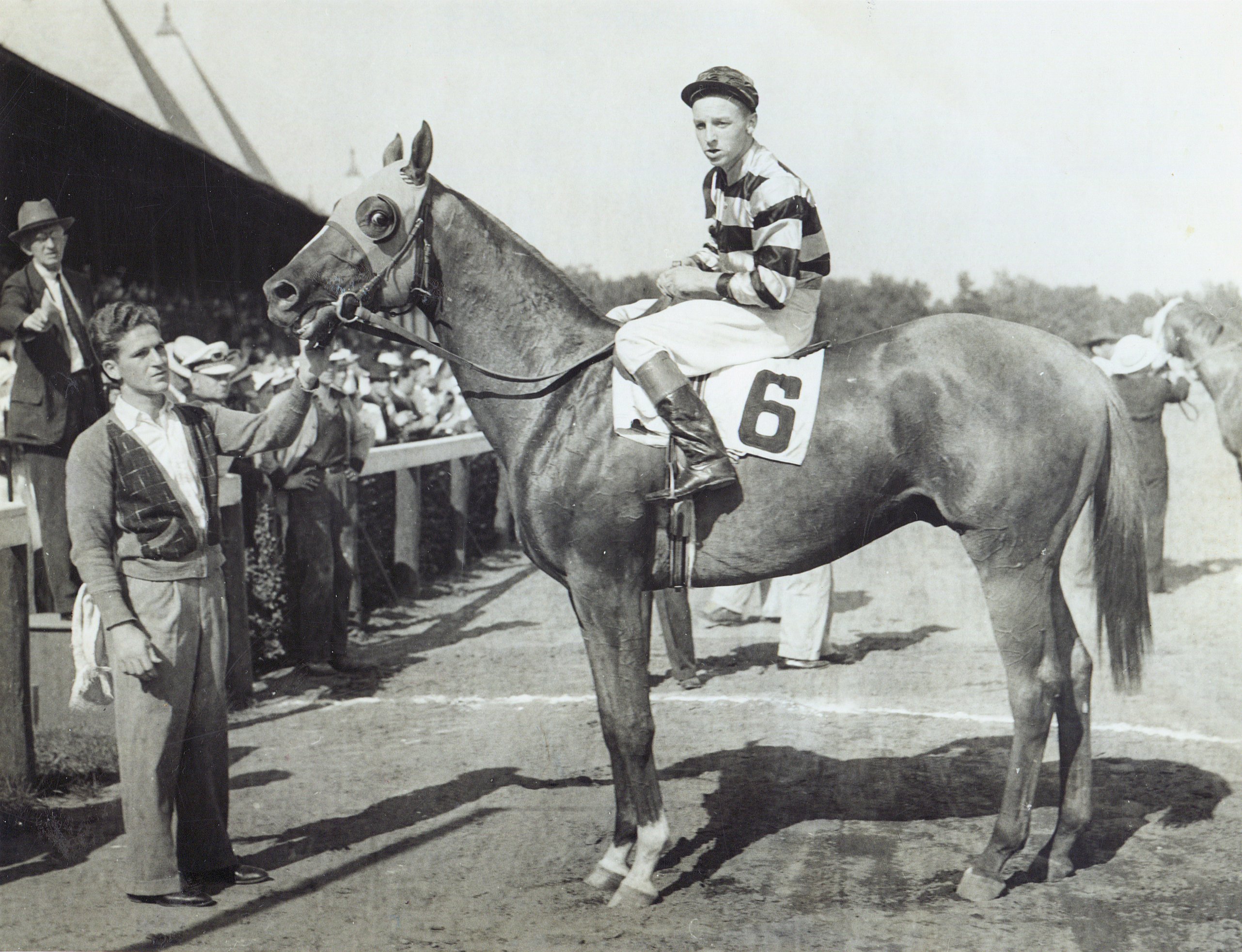 Wayne Wright and Hall of Famer Eight Thirty in the winner's circle for the 1938 Flash Stakes at Saratoga (Turf Pix/Museum Collection)