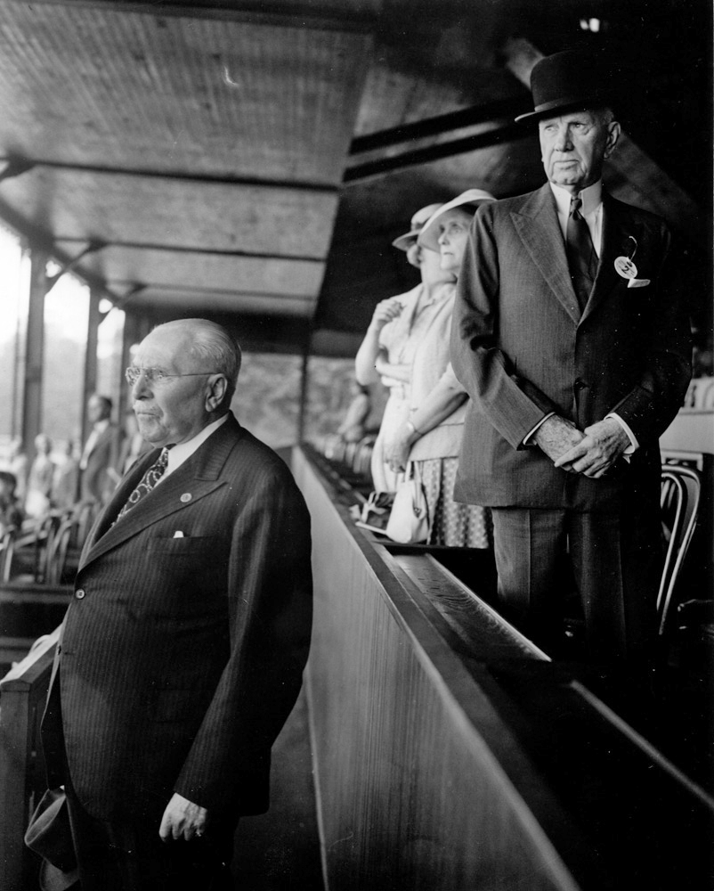 Samuel Riddle (left) and E. R. Bradley (right) in the clubhouse at Saratoga Race Course in 1937 (Bert and Richard Morgan/Museum Collection)