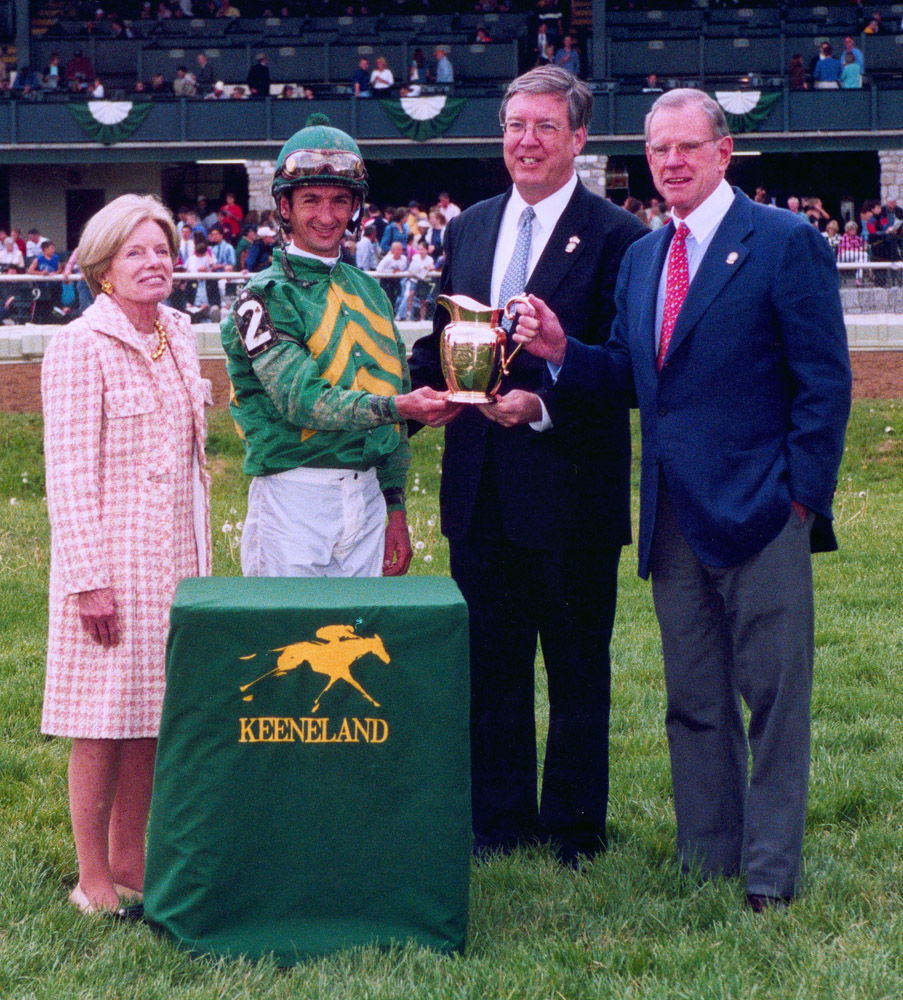 A gold pitcher is presented to Mr. and Mrs. Will Farish after Mineshaft's victory in the Ben Ali at Keeneland, April 2003 (Keeneland Association)
