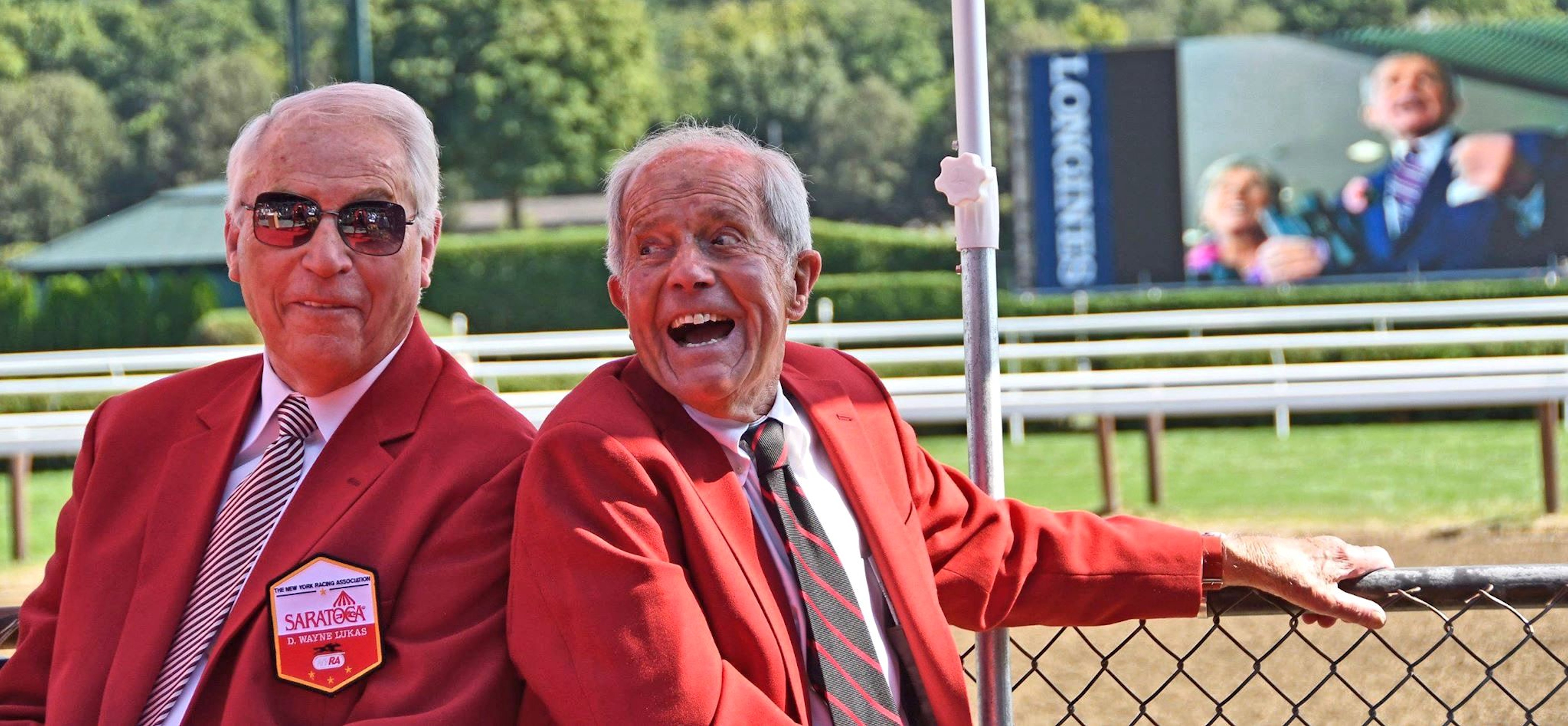 Trainer D. Wayne Lukas and Cot Campbell wear their red jackets during the 2018 Saratoga Walk of Fame ceremony (Barry Bornstein)