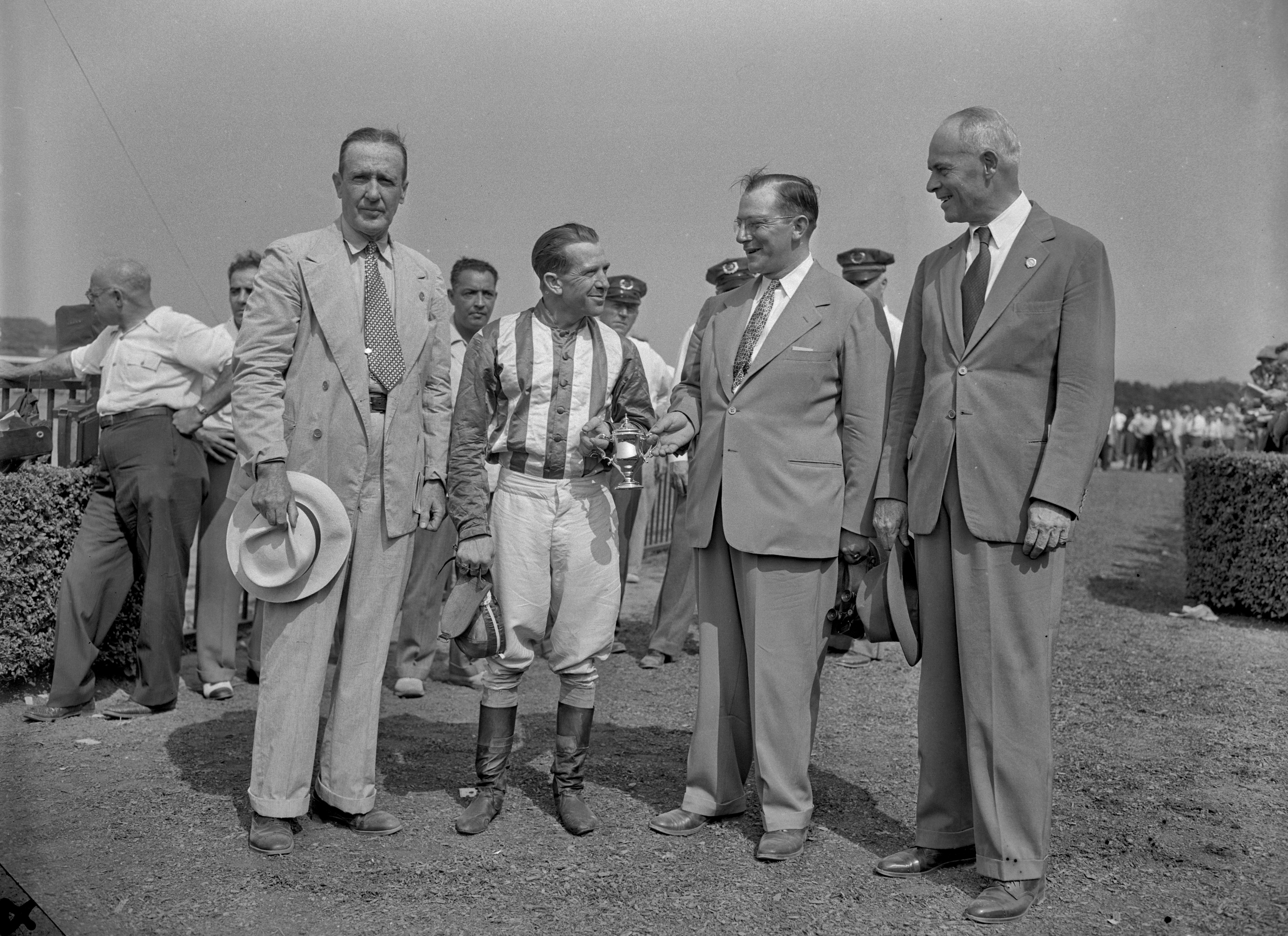 Winner's circle presentation for the 1944 Saratoga Special featuring, from left, F. S. von Stade, George Woolf, Oscar White, and Walter Jeffords, Sr. (Bert Morgan/Museum Collection)
