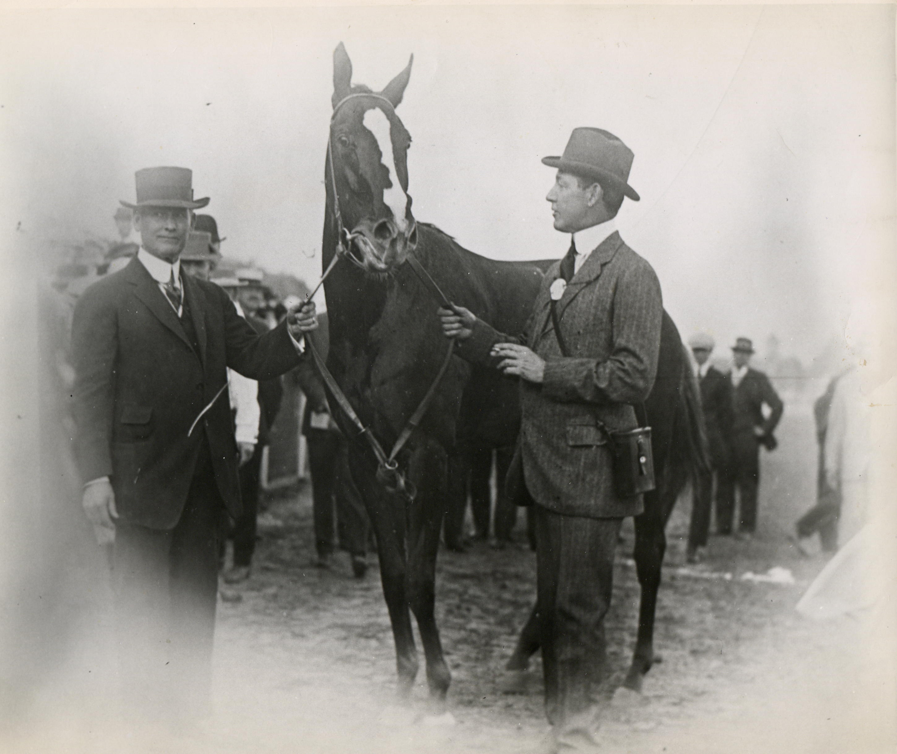 Trainer James G. Rowe, Sr. with Regret and owner Harry Payne Whitney (Museum Collection)