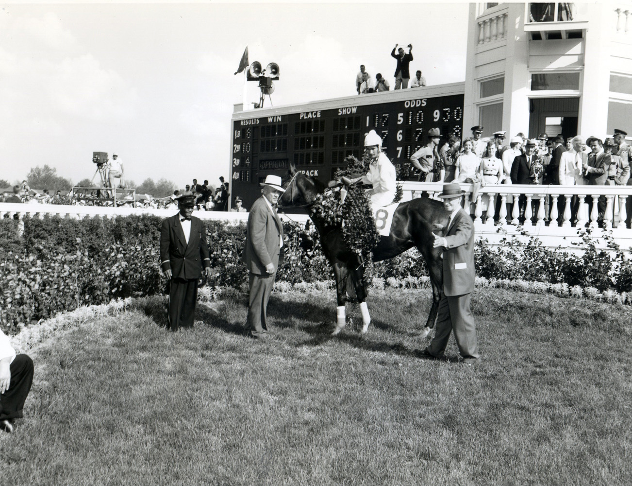 Frank E. Childs in the winner's circle with Tomy Lee (Bill Shoemaker up) for the 1959 Kentucky Derby (Churchill Downs Inc./Kinetic Corp. /Museum Collection)