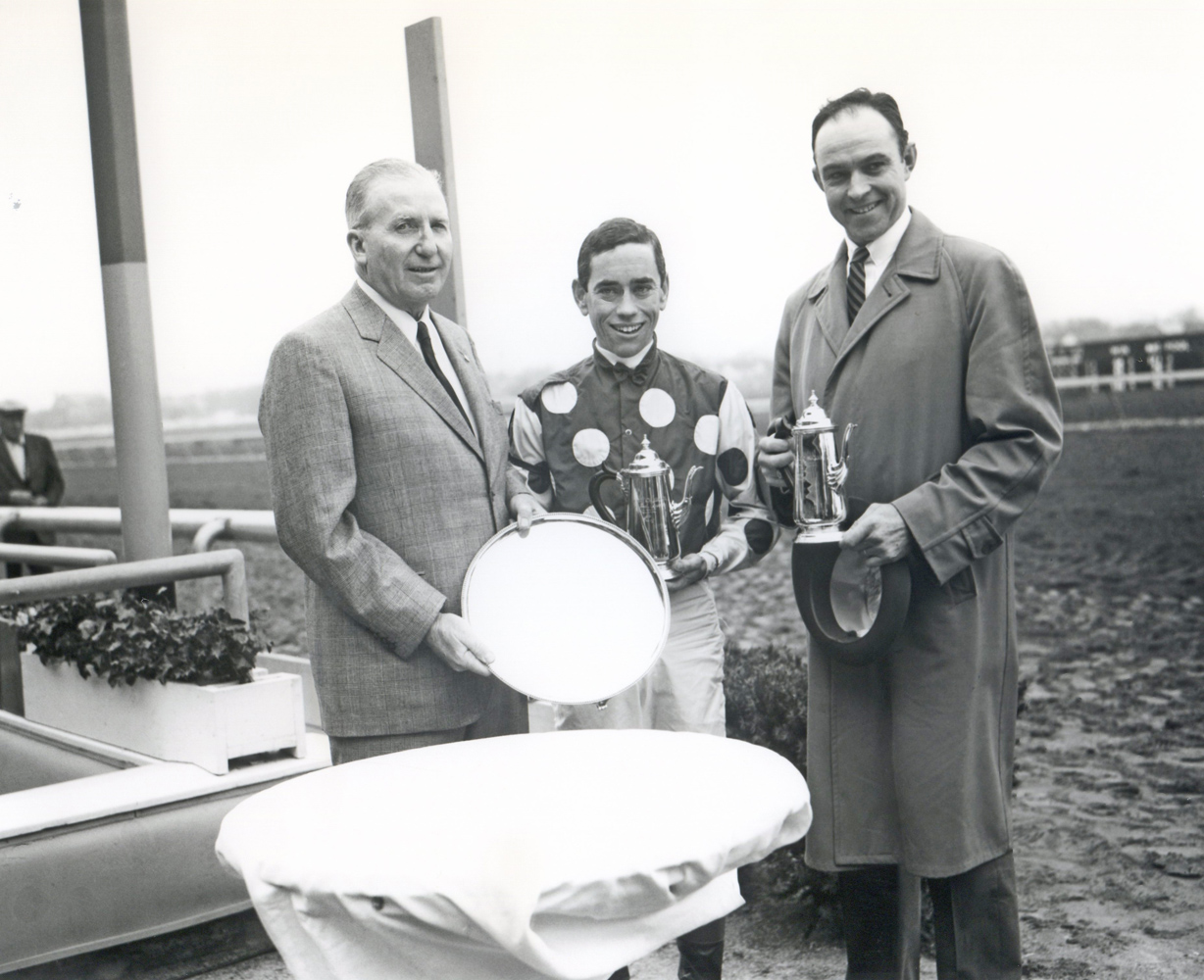 Jockey John Rotz and trainer T. J. Kelly at the trophy presentation for the 1961 Wood Memorial, won by Globemaster (Keeneland Library Morgan Collection/Museum Collection)