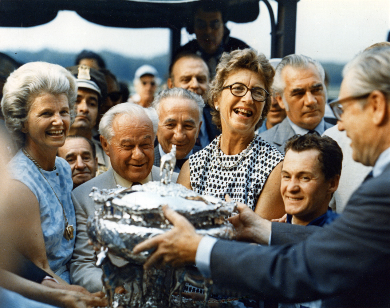 The winning connections of Secretariat receiving the August Belmont Memorial Trophy from New York Governor Nelson Rockefeller after winning the 1973 Belmont Stakes and Triple Crown (Museum Collection)