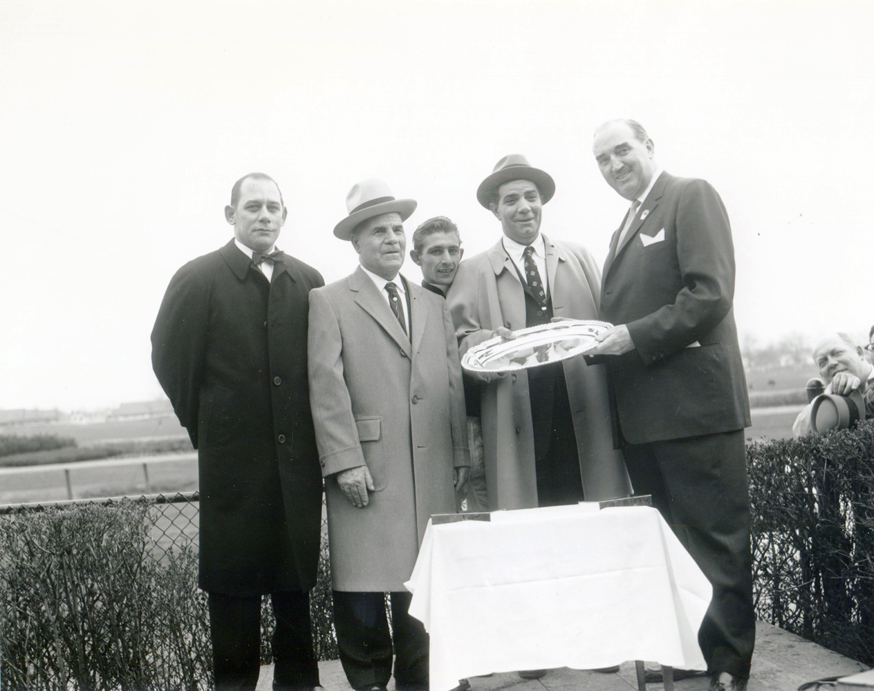 Frank Martin, Mr. Dolce, jockey Ray Broussard, Emil Dolce, and Queens Borough President John T. Clancy at the 1959 Wood Memorial trophy presentation at Jamaica (Keeneland Library Morgan Collection/Museum Collection)