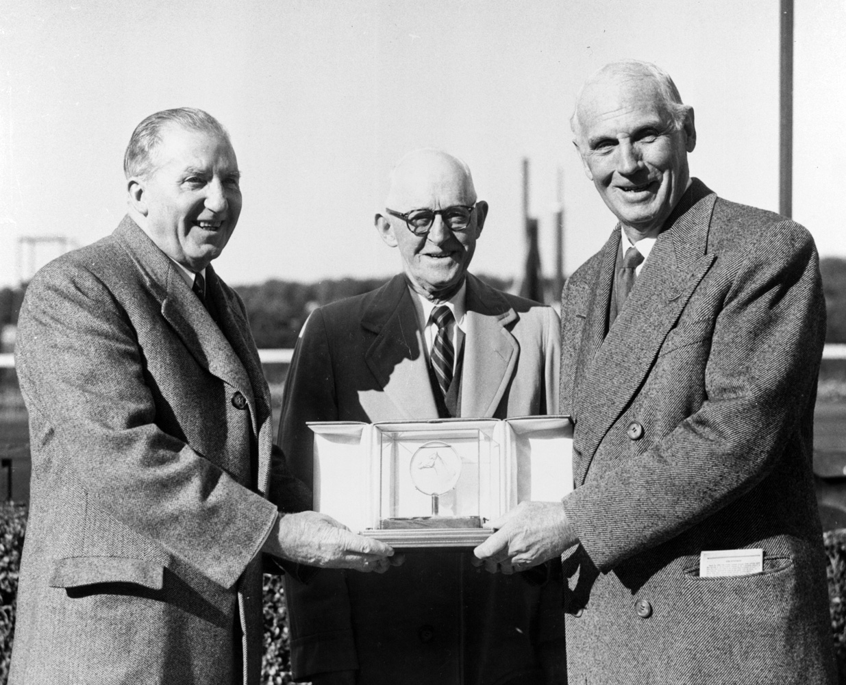 John W. Hanes, W. F. Bert Mulholland, and George D. Widener, Jr. at the trophy presentation for the 1957 Belmont Futurity, won by Jester (Keeneland Library Morgan Collection)