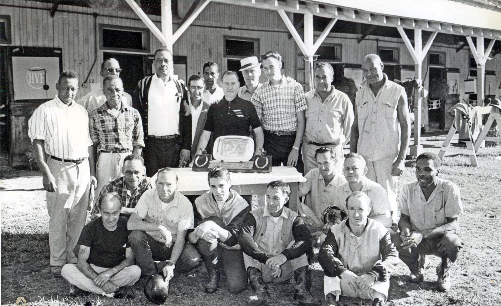 Harbor View Farm group photo at a surprise farewell trophy presentation for Burley Parke on the occasion of his retirement (Parke in center with trophy) (NYRA/Jim Sargent /Museum Collection)