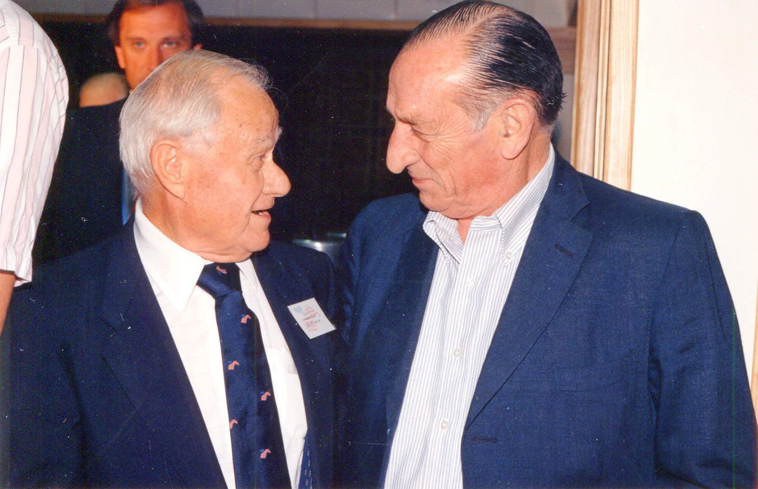 Hall of Fame trainers Lucien Laurin and Angel Penna at Hall of Fame Day, 1990 (Barbara D. Livingston/Museum Collection)