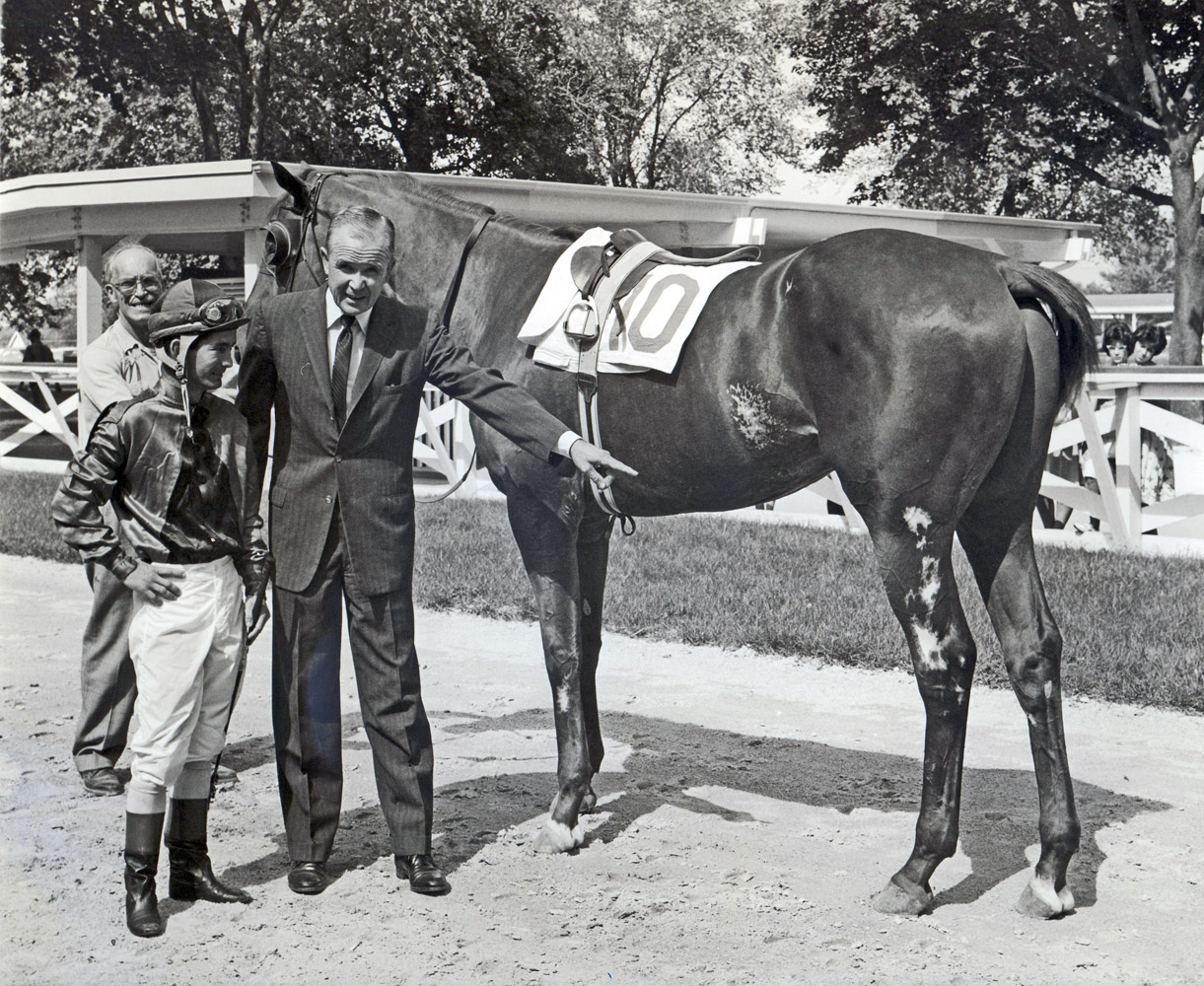 Bill Shoemaker, Mesh Tenney, and Candy Spots in the paddock (Museum Collection)