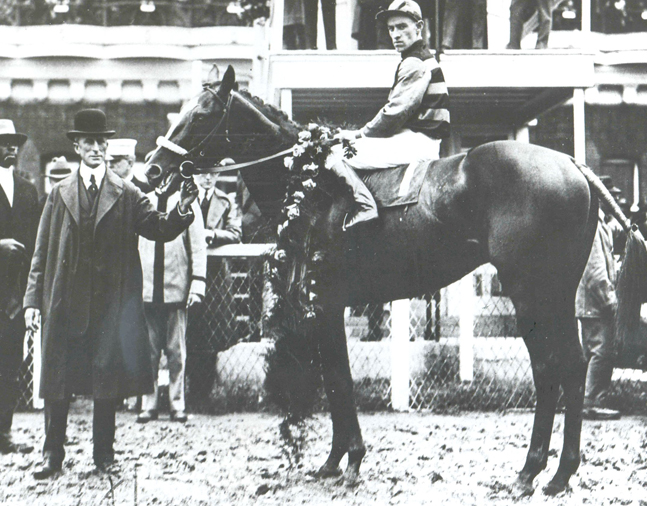 H. Guy Bedwell and Sir Barton, Johnny Loftus up, in the winner's circle, 1919 Kentucky Derby (Churchill Downs)