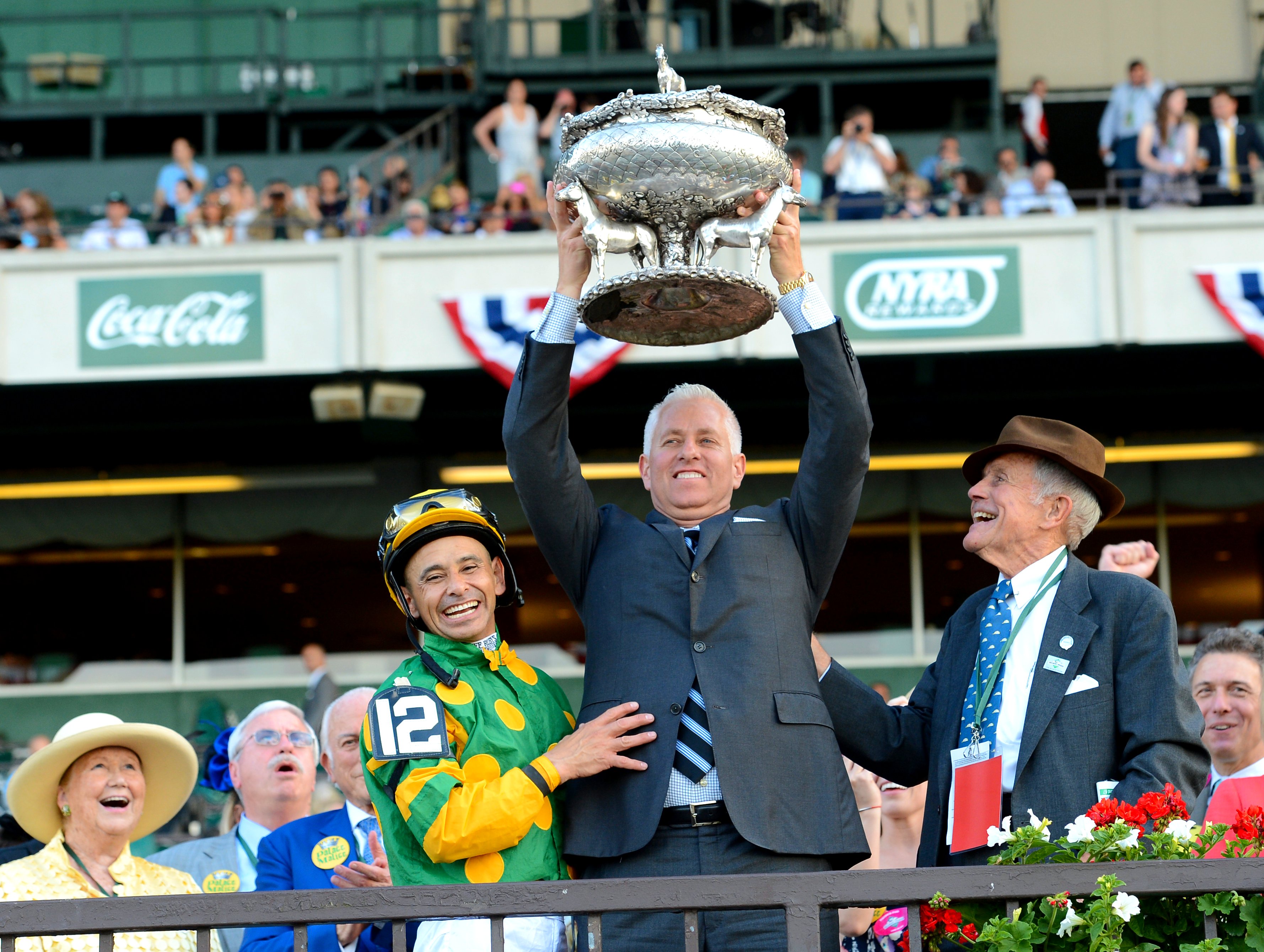 Todd Pletcher celebrates Palace Malice's 2013 Belmont Stakes victory with jockey Mike Smith and Cot Campbell of Dogwood Stable (NYRA)